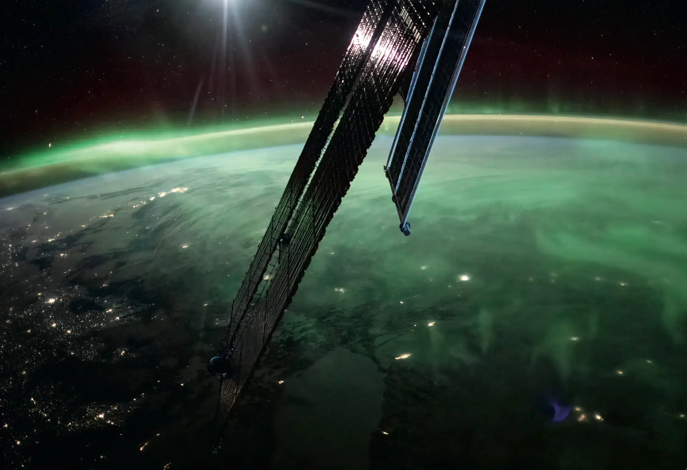 Space Exploration - Earth from space with solar panels